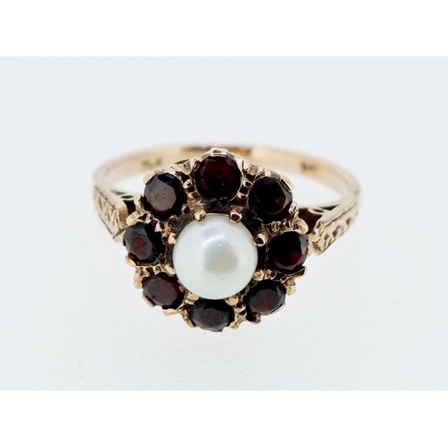 397 - A 9 carat gold pearl and garnet cluster ring, size K to L, 3.3g