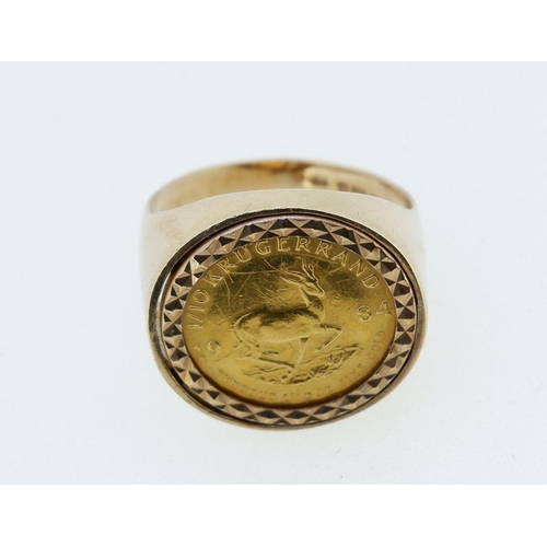 401 - A 9 carat gold ring set with a 1/10 kugerand 22 carat coin 1984, 8.3g, size P