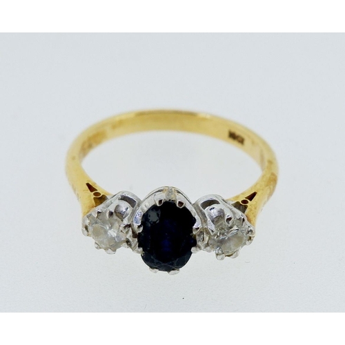 An 18 carat gold sapphire and diamond ring, size O, 4.1g