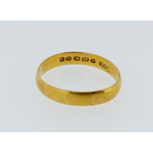 406 - A 22 carat gold wedding band, 4.4g