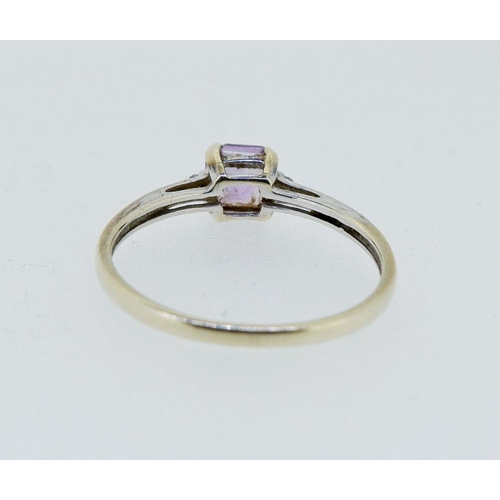 420 - A 9 carat gold amethyst and chip diamond ring, size K to L, 1.3g