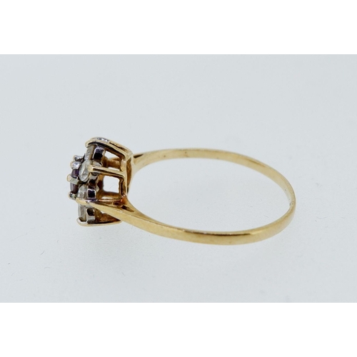 421 - A 9 carat gold cubic zirconium cluster ring, size N, 1.3g