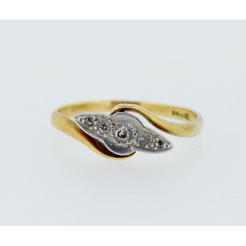 422 - An early 20th century 18 carat gold crossover ring set five graduated diamonds, 1.9g, size M