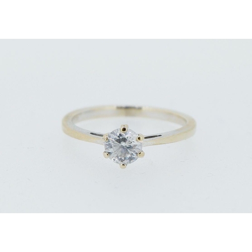 423 - An 18 carat gold solitaire diamond ring, size I to J, 2.2g