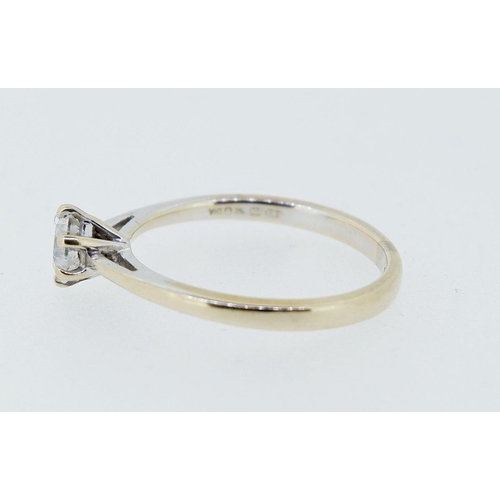 423 - An 18 carat gold solitaire diamond ring, size I to J, 2.2g