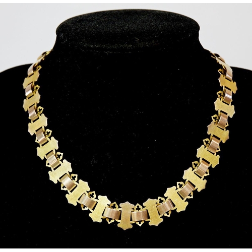 429 - A Victorian two colour 15 carat gold Gothic link collar necklace (with spare link), current length 4... 