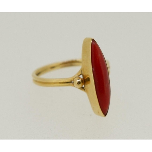 432 - An antique 18 carat gold ring set marquise cut cornelian, size K to L