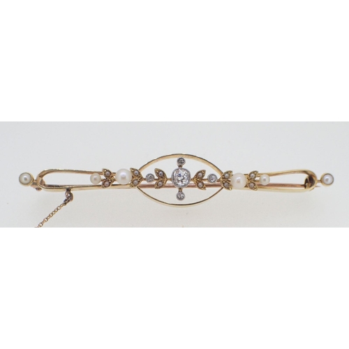 435 - An antique 15 carat gold bar brooch set diamonds and pearls, unmarked, 6g, 7cm long