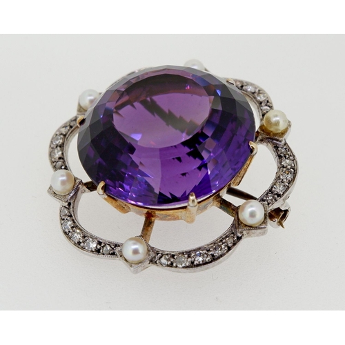 437 - A Victorian circular gold brooch set large amethyst within diamond and pearl lobed border, 3.5cm, 15... 