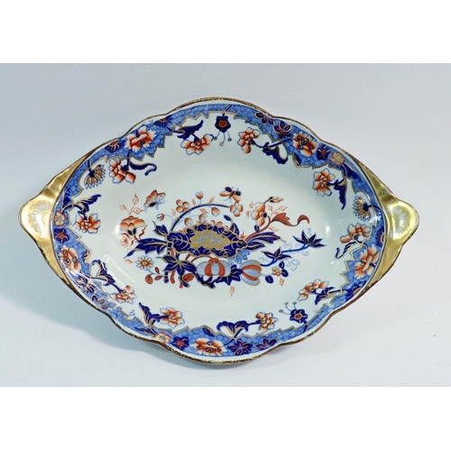 44 - A 19th century New Stone oval dish decorated in the Imari pallette, 26 x 18cm