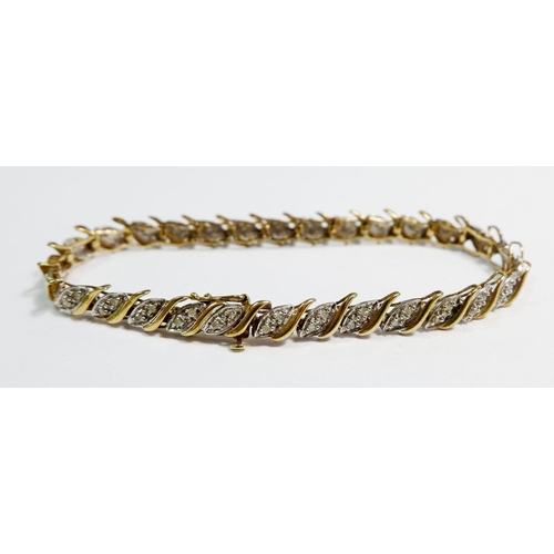 460 - A 9 carat gold bracelet set 58 round cut diamonds (each approx 1.3mm), 18cm, 8.4g