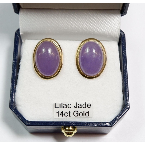 465 - A pair of 14 carat gold lilac jade oval earrings