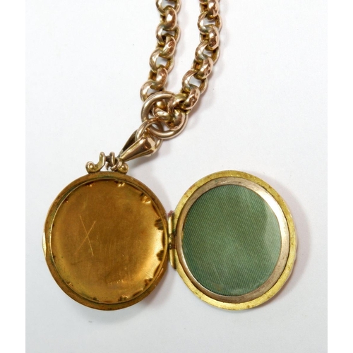 501 - A Victorian 9 carat cold circular engraved locket on 9 carat gold chain 12.2g total weight, 42cm lon... 