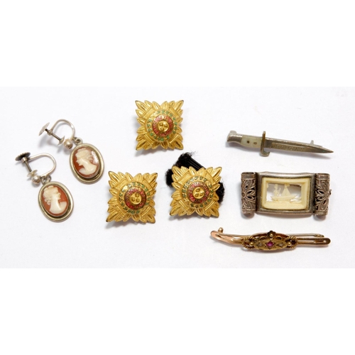 538 - An Edwardian 15 carat gold brooch, a pair of silver cameo earrings, a white metal and bone brooch, a... 