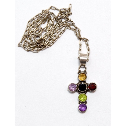 539 - A vintage silver crucifix set coloured stones on a silver chain, 46cm long