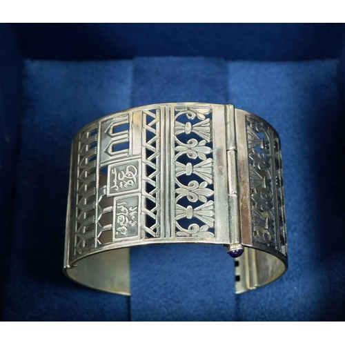 556 - An Azza Fahmy white metal hinged pierced bangle, boxed with certificate and bag