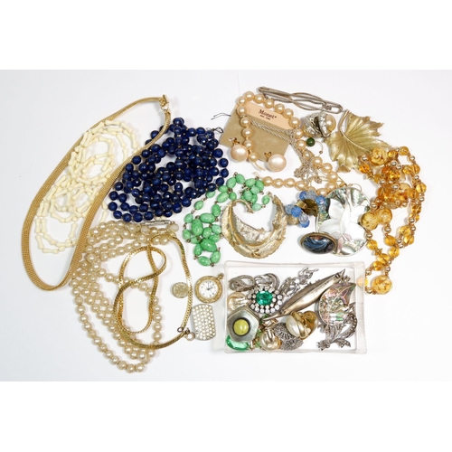 573 - A collection of vintage costume jewellery including two silver marcasite brooches etc.