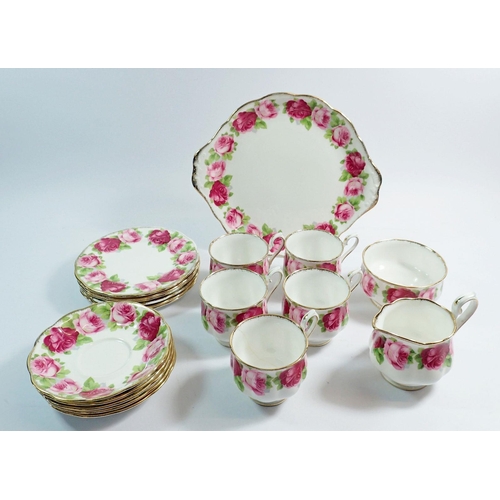 6 - A Royal Albert Old English Rose tea service including five cups and saucers, six side plates, one ca... 
