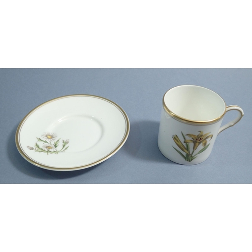 60 - A Royal Worcester botanical Lily & Iris cup and saucer