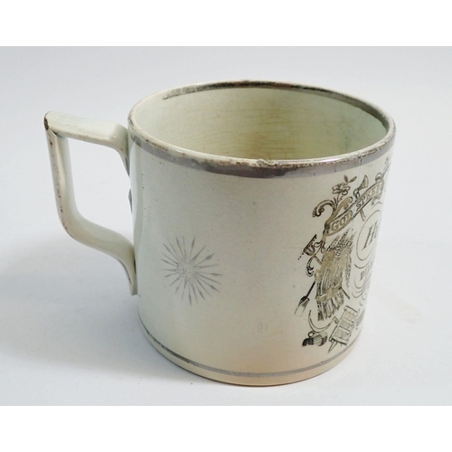 61 - A Sunderland silver lustre 'Husbandmans' mug 'Diligence Provides Bread' a/f, 9 cm tall