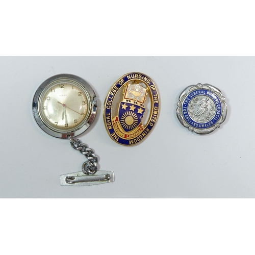 622 - A Nurse's Timex vintage watch and two nursing badges