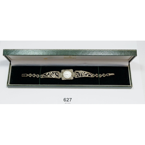 627 - A Brooks & Bentley silver marcasite bracelet watch