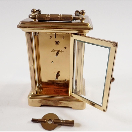 730 - A London Clock Co carriage clock with French movement and key, 11cm