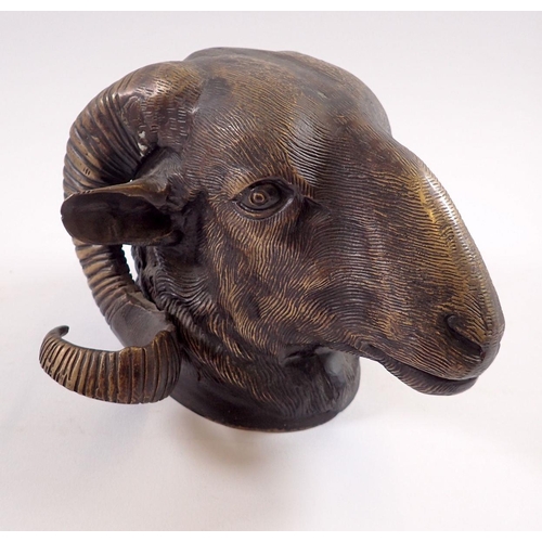 747 - A bronze rams head wall plaque, 14cm deep