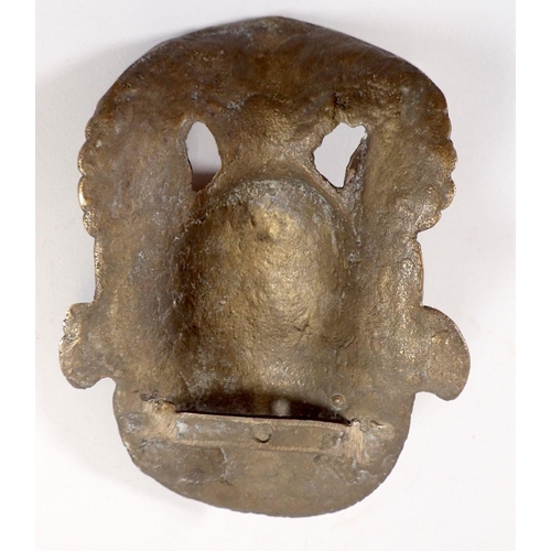 750 - A Thai brass wall mask, 18.5cm long