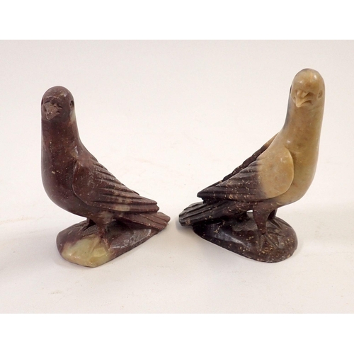 753 - A pair of Chinese carved stone doves, 8cm high