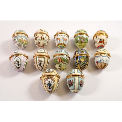 765 - A set of twelve Halcyon Days Easter egg form enamel boxes, 1980 to 1991