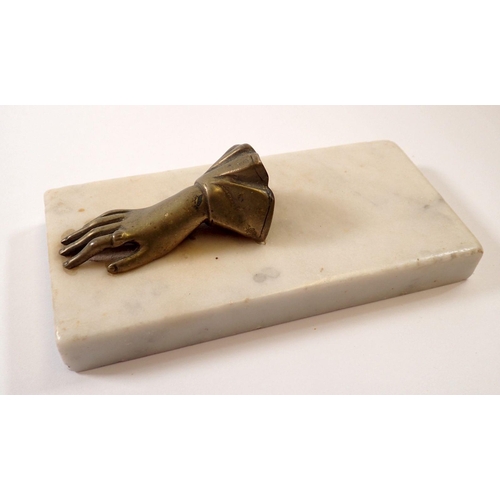 776 - A Victorian brass hand and marble paperweight, 15.5 x 7.5cm