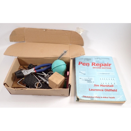 785 - A fountain pen repairing kit and book