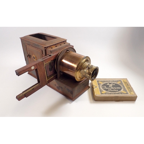 792 - A Victorian magic lantern 'Eclipse' by Beard and a box of blank lantern slides