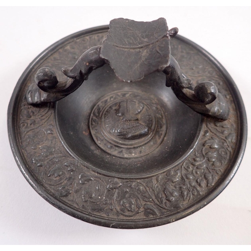 798 - A continental cast metal ashtray, three clay pipes and a silver plated chatelaine top