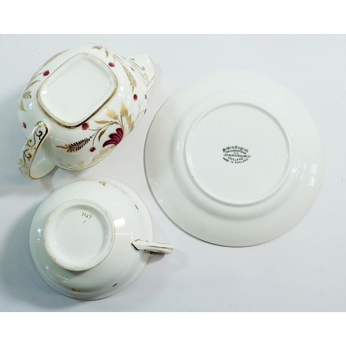 8 - An early 19th century porcelain gilded and purple foliate tea service comprising teapot, milk, sugar... 