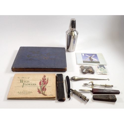 816 - A box of collectables to include silver handled button hook, The Metropolitan police whistle, Mab Ra... 