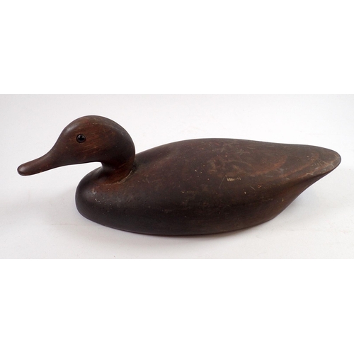 823 - Two carved wood decoy ducks, largest 37cm