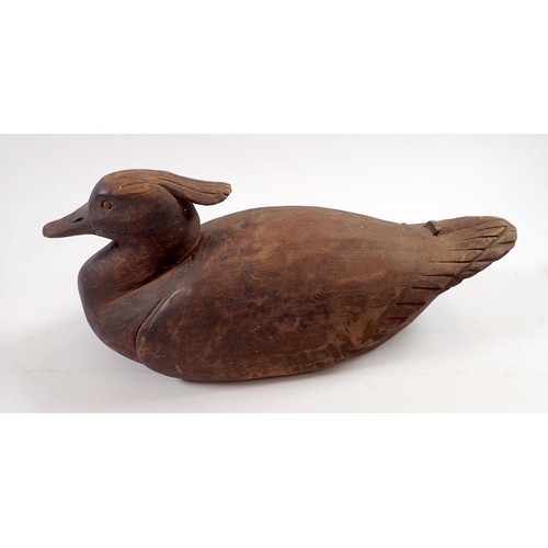 823 - Two carved wood decoy ducks, largest 37cm