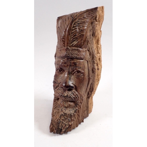 824 - Gladstone Reza - ironwood sculptural driftwood carving of a man's face, 20cm tall