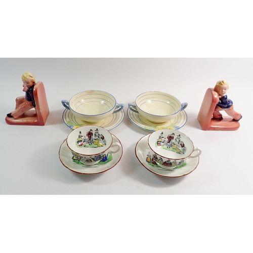 84 - A pair of naughty boy bookends, 14cm tall, two Welsh costumes cups and saucers and two Crown Ducal E... 