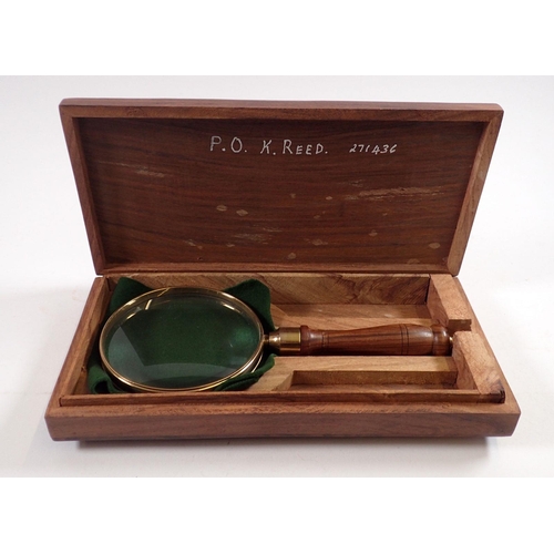 841 - A brass magnifying glass in wooden box