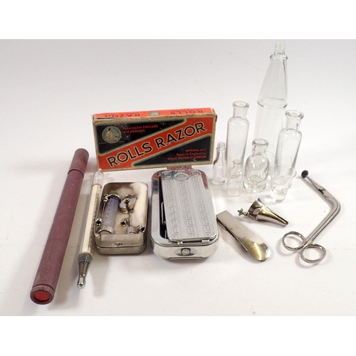 846 - A box of collectables including medical syringe, glass bottles, bath thermometer etc.