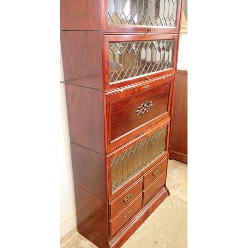 855 - A mahogany Globe Wernicke style bookcase with secretaire, four drawers and lead glazed panels