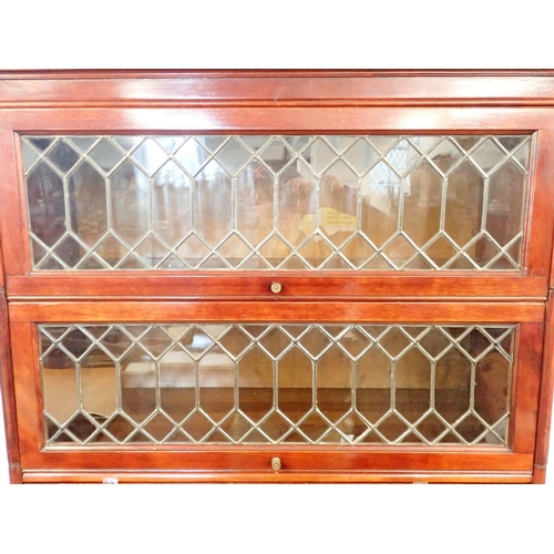 855 - A mahogany Globe Wernicke style bookcase with secretaire, four drawers and lead glazed panels