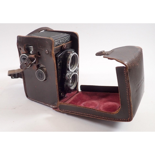 857 - An MPP Microcord camera with Ross Xpress lens in fitted leather case