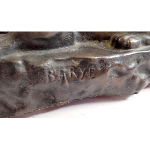 871 - A small bronze of a lioness after Barye, 18cm long