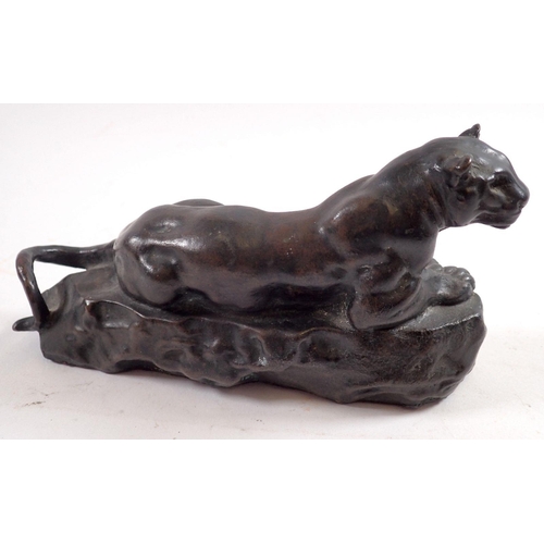 871 - A small bronze of a lioness after Barye, 18cm long