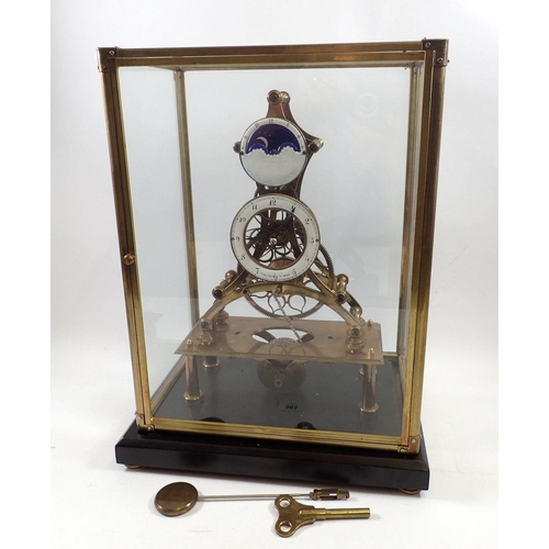 874 - An eight day skeleton clock with fusee movement and enamelled dials, including moonphase dial, signe... 