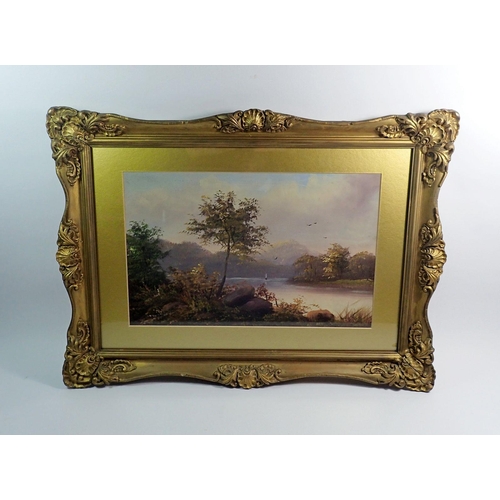 876 - A Victorian oil on board lakeland landscape in decorative gilt frame, 24 x 37cm